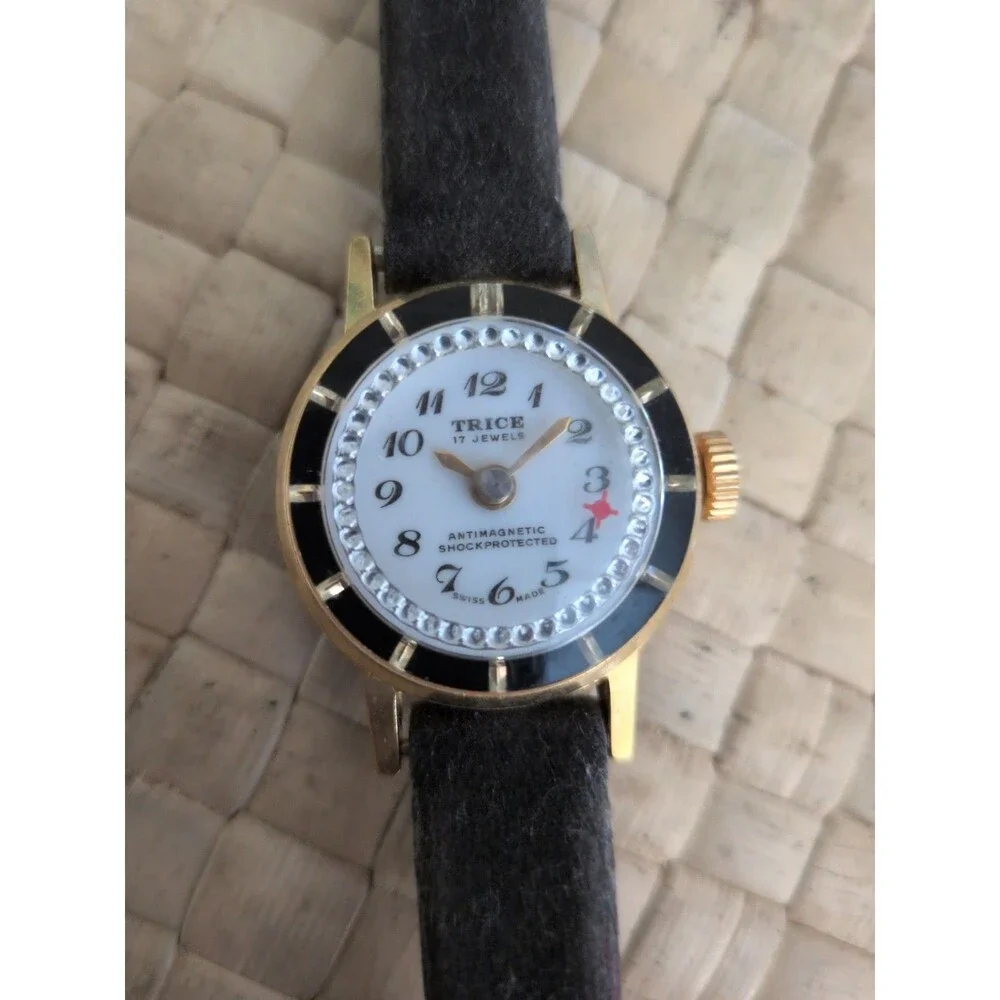 Trice Gold Tone White Dial 17 Jewels Blue Strap Vintage Watch